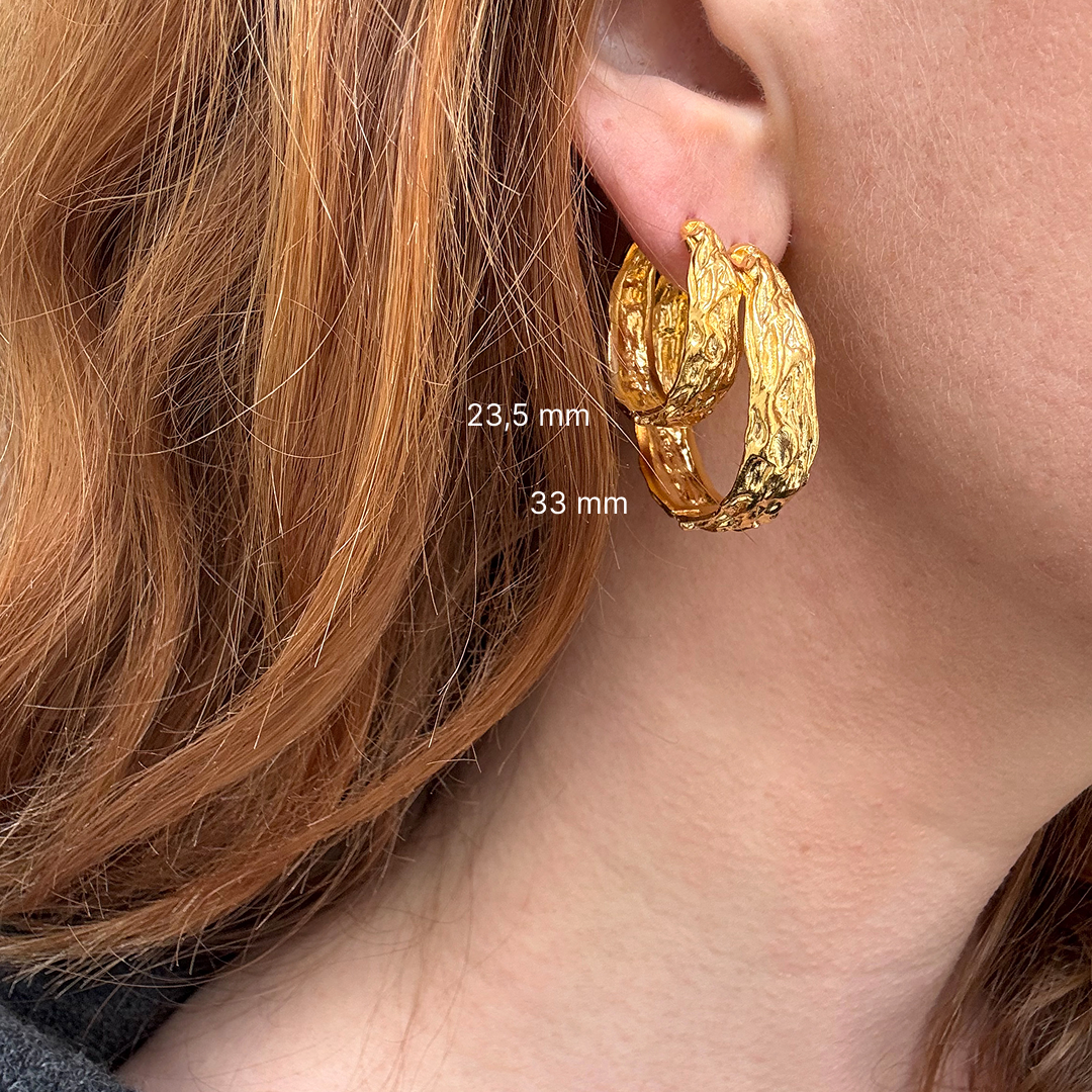 Créoles dorées au design fondu 23,5 mm