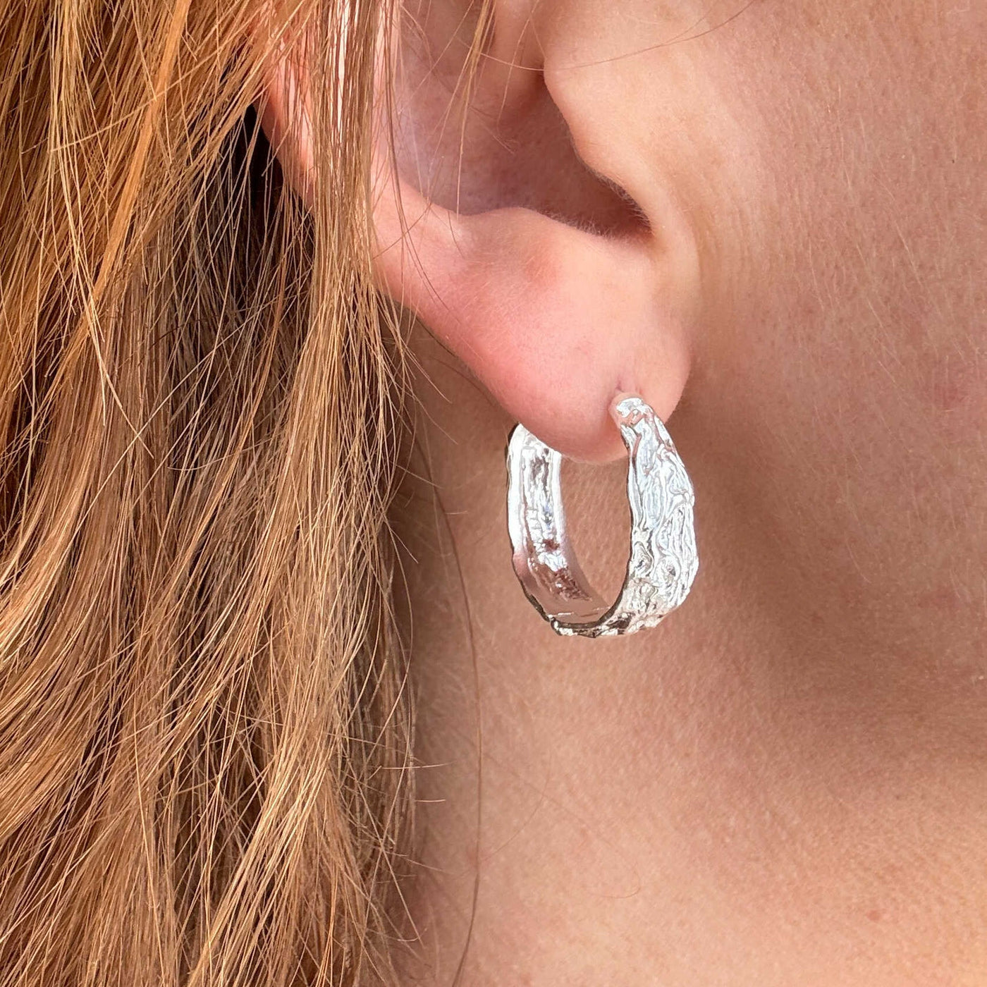 Créoles Melted 23,5 mm – Finition argentée