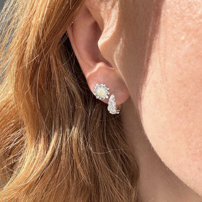 Boucles d’oreilles créoles fondues – Argentées